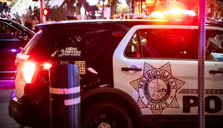 A las vegas metropolitan police vehicle with its lights on.