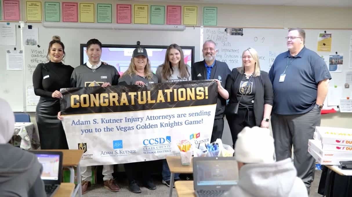 Adam s. Kutner and team surprising a local teacher from desert pines high school with tickets to a las vegas golden knights game.